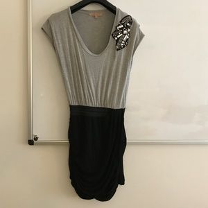 Grey shirt dress with bead detail and black skirt